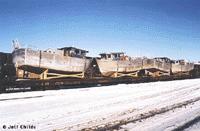 flat car hauling boats