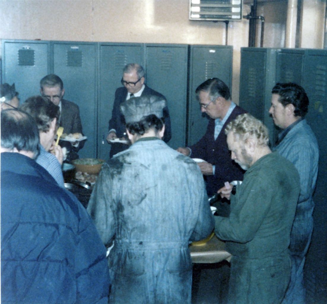 Christmas party December 1976. Dennis Herrin in green coveralls and beard.