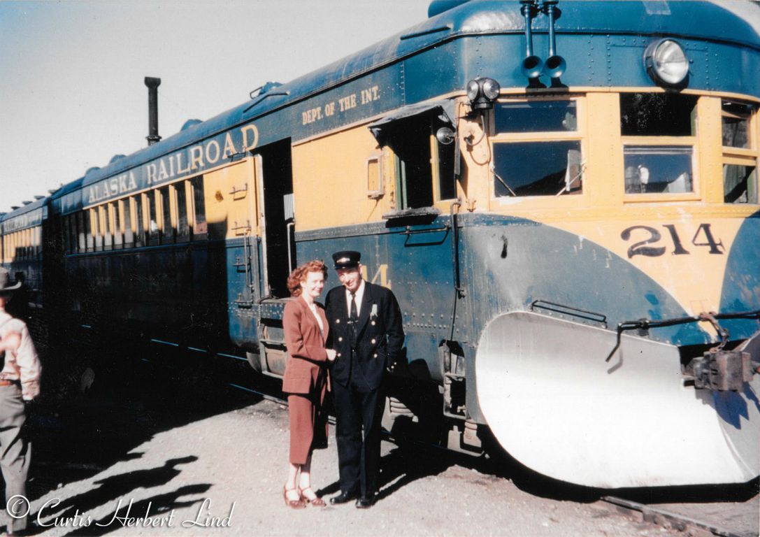 Great pose of a red head in red suit and red shoes! The Conductor did not have much to do on this train other than entertain the travelers. The 214 had just been rebuilt in 1948 to receive that new gold and blue paint job. The Brill was accompanied by a trailer on most runs, as it is here.Brill 214 was operated between McKinley Park and Fairbanks during Summer Season (See Prince’s book Page 783).