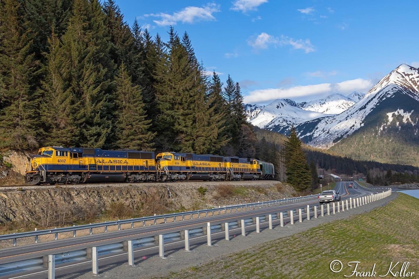 The highway and the tracks all share space between the mountains and Turnagain Arm. 